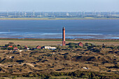 Great Norderney lighthouse, wind farm in background, Norderney island, Lower Saxony, Germany