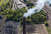 Aerial of a smoking chimney, Salzgitter Steelworks, Lower Saxony, Germany