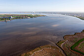 View over Lower Weser river to nuclear power station Unterweser, Stadland, Lower Saxony, Germany