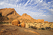 Red balancing granite rock in front of Great Spitzkoppe, Great Spitzkoppe, Namibia