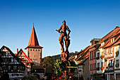 Fountain with knight and Obertor, Gengenbach, Black Forest, Baden-Württemberg, Germany