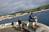 Anglers at harbour, Horta, Island of Faial, Azores, Portugal, Europe