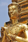 Bangkok (Thailand): a Buddhist statue at the Wat Phra Kaew