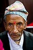 Portrait of a Nepali man.