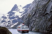 Norway, Nordland, Lofoten Islands, Coastal Steamer Kong Harald in the Trollfjord