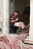 Fisherman mending nets, Stari Grad, Hvar, Split-Dalmatia, Croatia