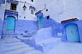 Three blue doorways in the Medina, Chefchaouen, Morocco, North Africa