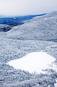 Franconia Notch State Park - Lonesome Lake from Hi-Cannon Trail during the winter months This trail leads to the summit of Cannon Mountain in the White Mountains, New Hampshire USA