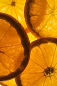 Thin slices of orange lit from behind