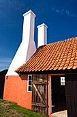 Old herring smokehouse in the sunlight, museum, Hasle, Bornholm, Denmark, Europe
