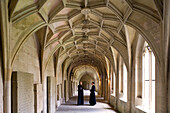 Monks at cloister at Bebenhausen monastery, Bebenhausen, Tübingen, Baden-Württemberg, Germany, Europe