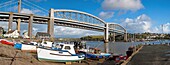 Boats at Saltash with the Royal Albert Bridge in the Background Cornwall England UK