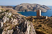 A typical Mani tower house overlooking the bay of Marmaris in the Deep Mani, Southern Peloponnese, Greece