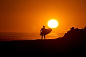Sunset surf session at Campus Point at UCSB on the Pacific Ocean near the city of Goleta in southern Califonia USA