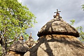 Traditional Konso village on a mountain ridge overlooking the rift valley Thatched roofs The Konso are living in tradtional villages with compunds for each family The compounds are connected by a maze of stone walled and fenced pathways  The Konso, a t
