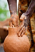 Pottery of the Dorze people of Ethiopia, Detail The tribe of the Dorze is living high up in the Guge Moutains above the ethiopian part of the rift valley Dorze can be translated with weaverWeaving of fabrics and garments is the traditional main sourc