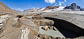 Panorama of the melting glacier Hochjochferner on the mountain pass Hochjoch Giogo Alto right at the border of Italy and Austria in Oetztal and Schnalstal val Senales The glacier hochjochferner retreated rapidly due to global warming, exposing more and