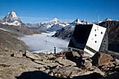 View over Monte-Rosa-Hut and Gorner glacier in early morning fog to Matterhorn, Zermatt, Canton of Valais, Switzerland, myclimate audio trail