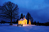 Illuminated chapel with Christmas tree, Werdenfelser Land, Upper Bavaria, Bavaria, Germany, Europe