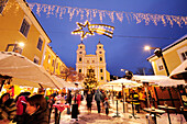 Christmas market Mondsee at night with church in background, lake Mondsee, Salzburg, Austria, Europe