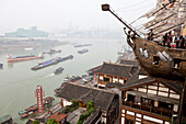 Yangzi, Yang-tse, Changjiang river with ship and boats, opera in the background, Chongqing, People's Republic of China
