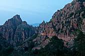 Spectacular road between Porto and Piana at dusk, on a stretch of 3 km there are special granite bluffs, rocks, Clanache de Piana, Porto, Corsica, France
