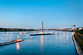 River Rhine and Rheinknie Bridge in the evening, view towards the city, Düsseldorf, Duesseldorf, North Rhine-Westphalia, Germany, Europe
