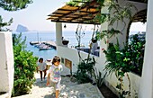Aeolian Island of Panarea, Italy Houses and restaurants on steep streets above the harbour