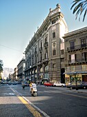 South along classical buildings of the Via Roma near junction with Via Bandiera in central Palermo, Sicily, Italy