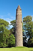 Well preserved ancient Celtic Christian monastic round tower in the town of Antrim, County Antrim, Northern Ireland