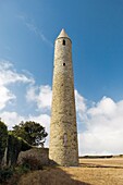 The early Celtic Christian Round Tower of Rattoo, south of Ballybunnion, County Kerry, Ireland, rises to 92 feet
