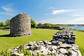 Stump of the Round Tower inside massive walls of Nendrum Monastery, Mahee Island, Strangford Lough, Co Down, Northern Ireland
