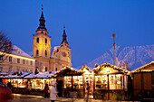 Christmas Market and church at dusk, Ludwigsburg, Baden Wurttemberg, Germany