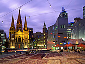 Federation Square and St Pauls Cathedral at dusk, Melbourne, Victoria, Australia