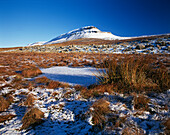 View to Pen y ghent over frozen pool, Ribblesdale, Yorkshire, UK - England