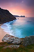 View over pristine beach at dawn, Porthcurno, Cornwall, UK - England