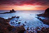 Rugged beach and seascape at sunset, Lands End, Cornwall, UK - England