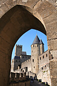 Walled city through archway, Carcassonne, Languedoc-Roussillon, France