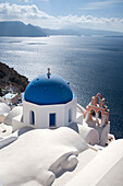 Church overlooking sea, Oia, Santorini Island, Greek Islands