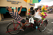 Dancing trishaw driver, Georgetown, Penang, Malaysia, Asia