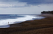 Beach at Etang-Sale under clouded sky, La Reunion, Indian Ocean