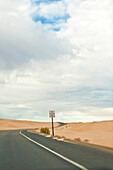 Road Through Desert, Imperial Sand Dunes, California, USA