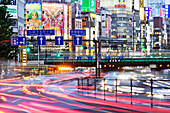 Japanese Downtown Traffic At Dusk, Shinjuku, Tokyo, Japan