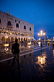 St. Mark's square at night in the rain, Piazza San Marco, Venice, Italy