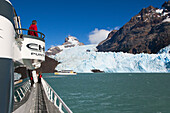 Man looking towards the glacier, Spegazzini glacier, Lago Argentino, Los Glaciares National Park, near El Calafate, Patagonia, Argentina