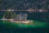 Island in the Lake Eibsee near Garmisch-Partenkirchen below the mountain Zugspitze, Upper Bavaria, Germany, Europe