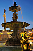 Fountain on Rossio square in the evening, Lisbon, Portugal, Europe