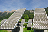 Solar panel in front of mountains, solar plant, photovoltaics, valley of Gailtal, Carinthia, Austria, Europe