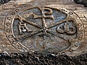 Sculpted Chi-Rho monogram (11th century) in St Nicholas's church, Tramezaïgues, Hautes-Pyrenees, Midi-Pyrenees, France