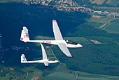 Two Single seat gliders Asw 19b and Discus 2CT in flight over french Lorraine countryside - France